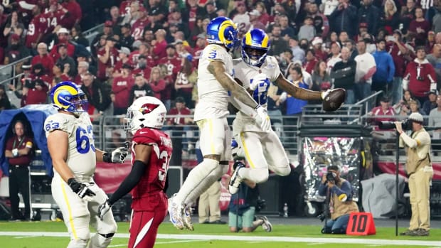 Dec 13, 2021; Glendale, Arizona, USA; Los Angeles Rams wide receiver Van Jefferson (12) celebrates his touchdown catch with wide receiver Odell Beckham Jr. (3) in front of Arizona Cardinals free safety Jalen Thompson (34) at State Farm Stadium. Mandatory Credit: Rob Schumacher-Arizona Republic

Nfl Los Angeles Rams At Arizona Cardinals